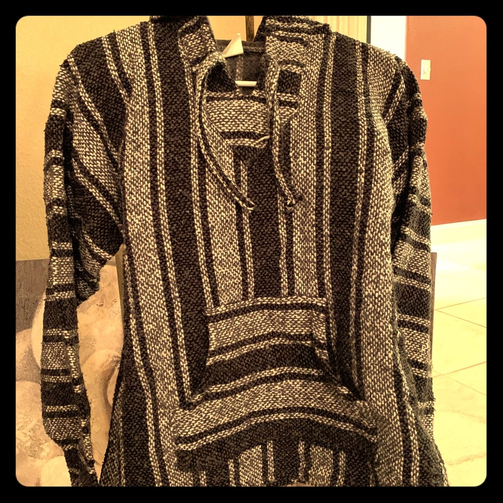 Black and white striped poncho